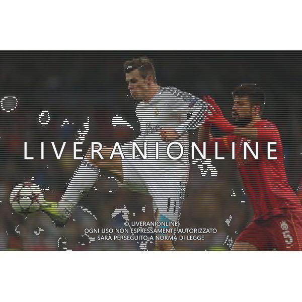 UEFA Champions League group B match between Real Madrid and Galatasaray SK at Santiago Bernabeu Stadium on November 27, 2013 in Madrid, Spain. Score: Real Madrid 4 vs Galatasaray 1 Pictured: Gokhan Zan of Galatasaray and Gareth Bale of Real Madrid. LIGA MISTRZOW SEZON 2013/2014 PILKA NOZNA REAL MADRYT vs GALATASARAY ISTAMBUL FOT.SESKIM PHOTO/NEWSPIX.PL POLAND, TURKEY, GERMANY, AUSTRIA AND UK OUT !!! --- Newspix.pl AG ALDO LIVERANI SAS ONLY ITALY *** Local Caption *** www.newspix.pl mail us: info@newspix.pl call us: 0048 022 23 22 222 --- Polish Picture Agency by Ringier Axel Springer Poland