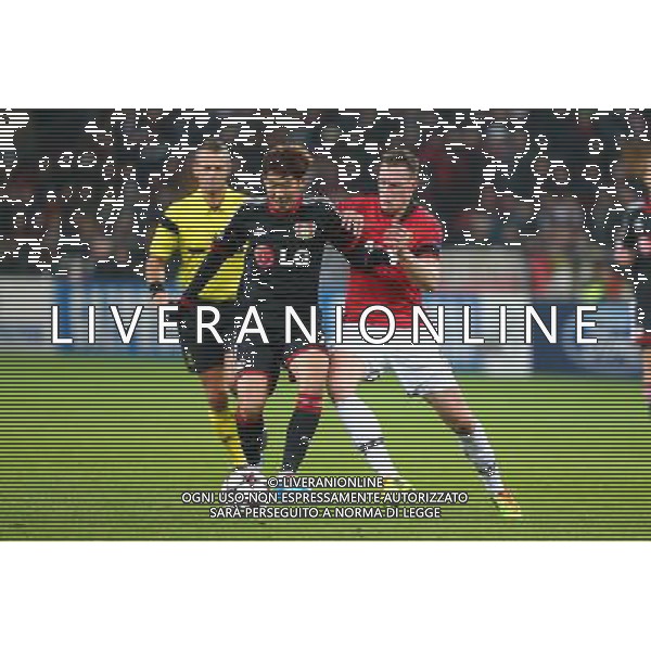 27.11.2013, BayArena, Leverkusen, GER, UEFA CL, Bayer Leverkusen vs Manchester United, Gruppe A, im Bild Heung Min Son (Bayer 04 Leverkusen) im Zweikampf mit Phil Jones (Manchester United), Aktion / Action // during UEFA Champions League group A match between Bayer Leverkusen vs Manchester United at the BayArena in Leverkusen, Germany on 2013/11/27. EXPA Pictures © 2013, PhotoCredit: EXPA/ Eibner-Pressefoto/ Neis *****ATTENTION - OUT of GER***** ©photoshot/AGENZIA ALDO LIVERANI SAS - ITALY ONLY - EDITORIAL USE ONLY