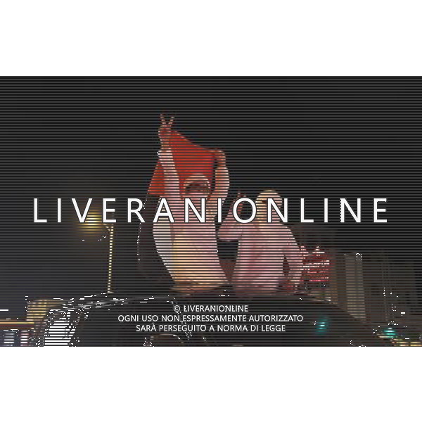 (131127) -- DUBAI, Nov. 27, 2013 () -- People celebrate on street in Dubai, for the right won to host World Expo 2020 at the 154th General Assembly of the Bureau International des Expositions (BIE), Nov. 27, 2013. (/Li Zhen) ©photohsot/AGENZIA ALDO LIVERANI SAS - ITALY ONLY - La citta\' di Dubai, si e\' aggiudicato il diritto di ospitare World Expo 2020 alla 154ma Assemblea Generale del Bureau International des Expositions (BIE), Emirati Arabi Uniti 27 novembre 2013.