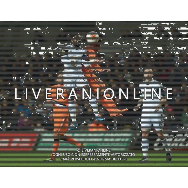 Swansea City\'s Nathan Dyer challenges Valencia\'s Juan Bernat for the ball Photo by Ian Cook/CameraSport Football - UEFA Europa League Group A - Swansea City v Valencia - Thursday 28th November 2013 - The Liberty Stadium - Swansea © CameraSport - 43 Linden Ave. Countesthorpe. Leicester. England. LE8 5PG - Tel: +44 (0) 116 277 4147 - admin@camerasport.com - www.camerasport.com AG ALDO LIVERANI SAS ONLY ITALY