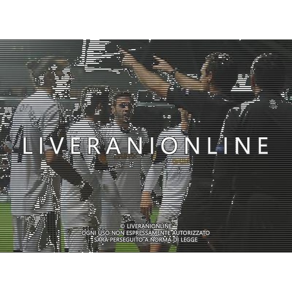 Referee Luca Banti orders the players away after `swansea City\'s Alvaro Vazquez\'s goal was disallowed for off side Photo by Ian Cook/CameraSport Football - UEFA Europa League Group A - Swansea City v Valencia - Thursday 28th November 2013 - The Liberty Stadium - Swansea © CameraSport - 43 Linden Ave. Countesthorpe. Leicester. England. LE8 5PG - Tel: +44 (0) 116 277 4147 - admin@camerasport.com - www.camerasport.com AG ALDO LIVERANI SAS ONLY ITALY
