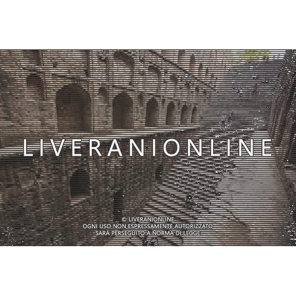 (131202) --NEW DELHI, Dec. 2, 2013 () -- Citizens visit Ugrasen ki Baoli, one of the stepwells in New Delhi, capital of India, Dec. 1, 2013. Stepwells are wells or ponds in which the water may be reached by descending a set of steps. They are most common in western and north India. Some of the stepwells are covered and protected and often of architectural significance. The construction may be utilitarian, but sometimes includes significant architectural embellishments. (/Zheng Huansong)(srb) ©photoshot/AGENZIA ALDO LIVERANI SAS - ITALY ONLY - Veduta di Agrasen ki Baoli, la gradinata a Nuova Delhi, in India, 1 dicembre 2013 formata da pozzi o bacini in cui l\'acqua puo\' essere raggiunta scendendo una serie di passagg di importanza architettonica