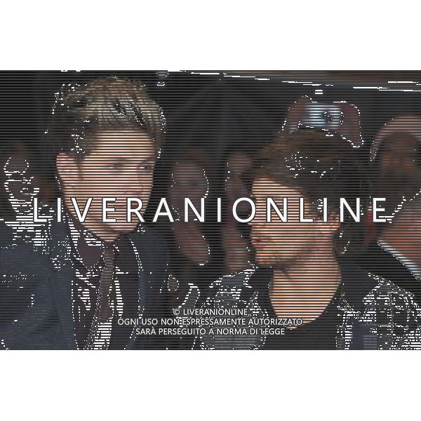 Niall Horan and Louis Tomlinson from One Direction attend the World Premiere of The Class Of 92, Odeon West End, London. 1st December 2013 ©PHOTOSHOT/AGENZIA ALDO LIVERANI SAS -