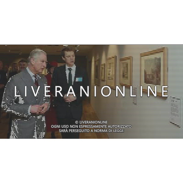 The Prince of Wales looks at water colour paintings by local artists during a visit to The Higgins in Bedford. ©PHOTOSHOT/AGENZIA ALDO LIVERANI SAS - - REALI INGLESI: Il Principe Carlo d\'inghilterra durante la sua visita a Bedfordshire