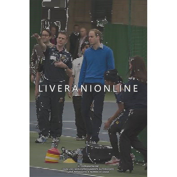 The Duke of Cambridge, as Patron of The Royal Foundation of The Duke and Duchess of Cambridge and Prince Harry, will visit a Coach Core apprentice training session at Westway Sports Centre. The Duke and Duchess of Cambridge and Prince Harry launched their Coach Core programme in July 2012 the day prior to the London Olympics. Coach Core provides an intense programme of training to 16-24 year olds, many from disadvantaged social backgrounds, to become qualified sports coaches who can inspire their peers. The project aspires to guide the apprentices into meaningful employment and enable them to commit to a sustained involvement in sports coaching in their communities. The first cohort of apprentice coaches are now nearing the end of their training and most will graduate from the project in February 2014. London ©PHOTOSHOT/AGENZIA ALDO LIVERANI SAS - ITALY ONLY - EDITORIAL USE ONLY - REALI INGLESI: Il principe William d\'inghilterra, durante un allenamento di formazione per apprendisti Allenatori al centro sportivo Westway a Londra
