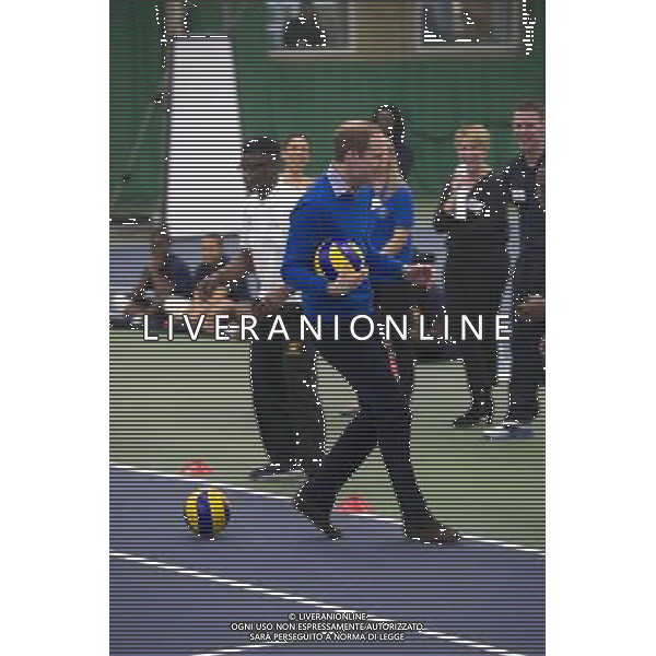 The Duke of Cambridge, as Patron of The Royal Foundation of The Duke and Duchess of Cambridge and Prince Harry, will visit a Coach Core apprentice training session at Westway Sports Centre. The Duke and Duchess of Cambridge and Prince Harry launched their Coach Core programme in July 2012 the day prior to the London Olympics. Coach Core provides an intense programme of training to 16-24 year olds, many from disadvantaged social backgrounds, to become qualified sports coaches who can inspire their peers. The project aspires to guide the apprentices into meaningful employment and enable them to commit to a sustained involvement in sports coaching in their communities. The first cohort of apprentice coaches are now nearing the end of their training and most will graduate from the project in February 2014. London ©PHOTOSHOT/AGENZIA ALDO LIVERANI SAS - ITALY ONLY - EDITORIAL USE ONLY - REALI INGLESI: Il principe William d\'inghilterra, durante un allenamento di formazione per apprendisti Allenatori al centro sportivo Westway a Londra