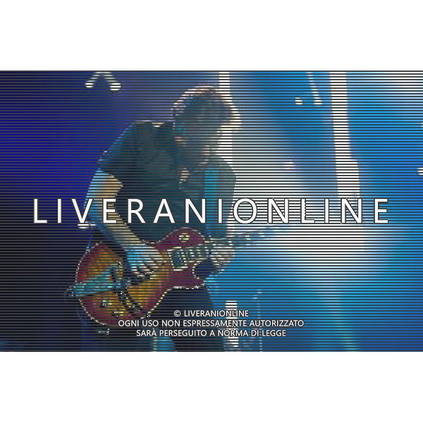 Simple Minds plays O2 Arena on 30/11/2013 at O2 Arena, London. Persons pictured: Charlie Burchill. ©photohsot/AGENZIA ALDO LIVERANI SAS - ITALY ONLY - EDITORIAL USE ONLY ©PHOTOHSOT/AGENZIA ALDO LIVERANI SAS - ITALY ONLY - EDITORIAL USE ONLY