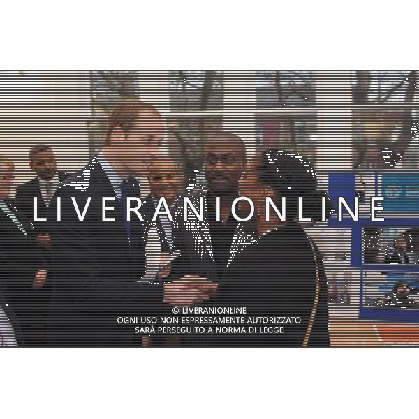 The Duke of Cambridge meets Ricky Dehaney (centre) and Andrea Sterling (right) from Prisonlink during his visit to South and City College, Birmingham. ©photoshot/AGENZIA ALDO LIVERANI SAS - ITALY ONLY - REALI INGLESI: Il principe William d\'inghilterra in visita a Sud e City College, Birmingham.