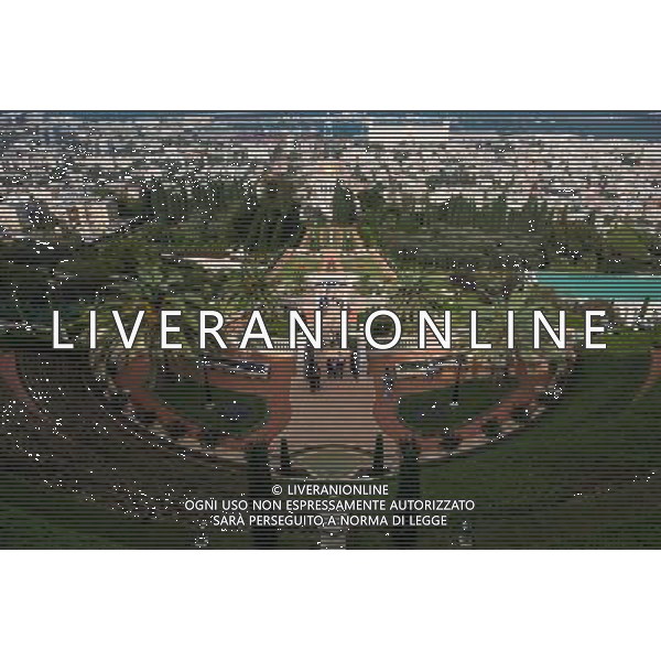 (131207) -- HAIFA (ISRAEL), Dec. 7, 2013 () -- Visitors tour the terraces of the Shrine of the Bab in Haifa, Israel, on Nov. 1, 2013. The Baha\'i Holy Places in Haifa and Western Galilee in Israel was inscribed on the UNESCO World Heritage List in 2008 for their profound spiritual meaning and the testimony they bear to the strong tradition of pilgrimage in the Baha\'i faith. The property includes the two most holy places in the Baha\'i religion associated with the founders, the Shrine of Baha\'u\'llah in Acre and the Shrine of the Bab in Haifa, together with their surrounding gardens, associated buildings and monuments. These two shrines are part of a larger complex of buildings, monuments and sites at seven distinct locations in Haifa and Western Galilee that are visited as part of the Baha\'i pilgrimage. (/Li Rui) AG ALDO LIVERANI SAS ONLY ITALY