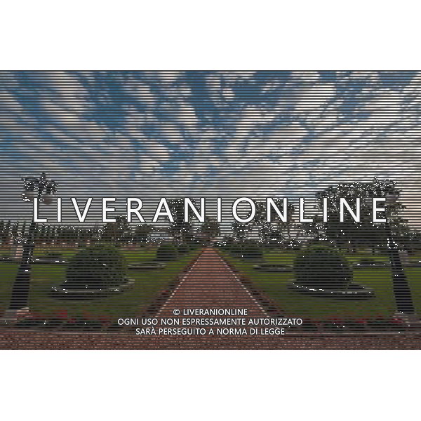 (131207) -- HAIFA (ISRAEL), Dec. 7, 2013 () -- Photo taken on Dec. 4, 2013 shows a garden near the Shrine of Baha\'u\'llah in Bahji near Acre, Israel. The Baha\'i Holy Places in Haifa and Western Galilee in Israel was inscribed on the UNESCO World Heritage List in 2008 for their profound spiritual meaning and the testimony they bear to the strong tradition of pilgrimage in the Baha\'i faith. The property includes the two most holy places in the Baha\'i religion associated with the founders, the Shrine of Baha\'u\'llah in Acre and the Shrine of the Bab in Haifa, together with their surrounding gardens, associated buildings and monuments. These two shrines are part of a larger complex of buildings, monuments and sites at seven distinct locations in Haifa and Western Galilee that are visited as part of the Baha\'i pilgrimage. (/Li Rui) AG ALDO LIVERANI SAS ONLY ITALY