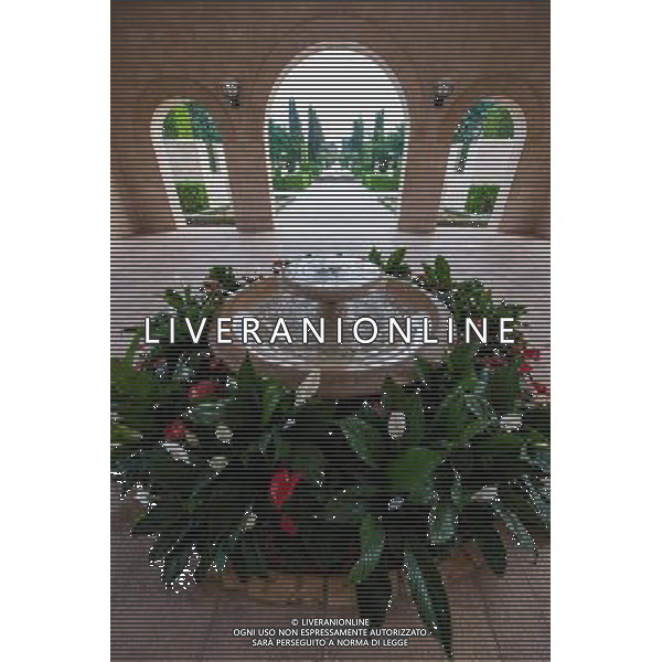 (131207) -- HAIFA (ISRAEL), Dec. 7, 2013 () -- Photo taken on Dec. 4, 2013 shows a garden near the Shrine of Baha\'u\'llah in Bahji near Acre, Israel. The Baha\'i Holy Places in Haifa and Western Galilee in Israel was inscribed on the UNESCO World Heritage List in 2008 for their profound spiritual meaning and the testimony they bear to the strong tradition of pilgrimage in the Baha\'i faith. The property includes the two most holy places in the Baha\'i religion associated with the founders, the Shrine of Baha\'u\'llah in Acre and the Shrine of the Bab in Haifa, together with their surrounding gardens, associated buildings and monuments. These two shrines are part of a larger complex of buildings, monuments and sites at seven distinct locations in Haifa and Western Galilee that are visited as part of the Baha\'i pilgrimage. (/Li Rui) AG ALDO LIVERANI SAS ONLY ITALY