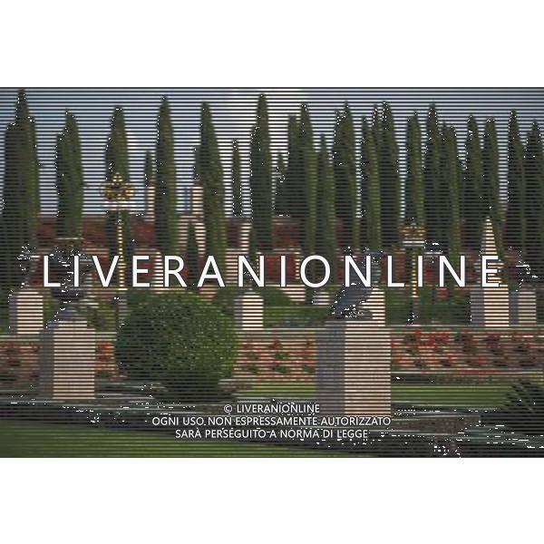 (131207) -- HAIFA (ISRAEL), Dec. 7, 2013 () -- Photo taken on Dec. 4, 2013, shows a garden in front of the Shrine of Baha\'u\'llah in Bahji near Acre, Israel. The Baha\'i Holy Places in Haifa and Western Galilee in Israel was inscribed on the UNESCO World Heritage List in 2008 for their profound spiritual meaning and the testimony they bear to the strong tradition of pilgrimage in the Baha\'i faith. The property includes the two most holy places in the Baha\'i religion associated with the founders, the Shrine of Baha\'u\'llah in Acre and the Shrine of the Bab in Haifa, together with their surrounding gardens, associated buildings and monuments. These two shrines are part of a larger complex of buildings, monuments and sites at seven distinct locations in Haifa and Western Galilee that are visited as part of the Baha\'i pilgrimage. (/Li Rui) AG ALDO LIVERANI SAS ONLY ITALY