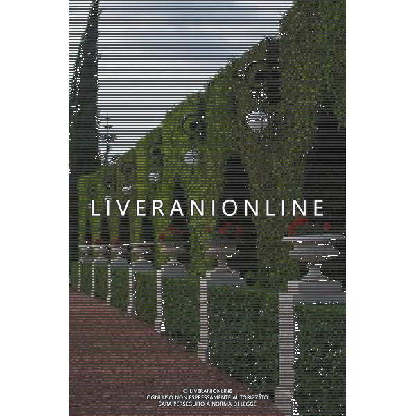 (131207) -- HAIFA (ISRAEL), Dec. 7, 2013 () -- Photo taken on Dec. 4, 2013, shows a garden in front of the Shrine of Baha\'u\'llah in Bahji near Acre, Israel. The Baha\'i Holy Places in Haifa and Western Galilee in Israel was inscribed on the UNESCO World Heritage List in 2008 for their profound spiritual meaning and the testimony they bear to the strong tradition of pilgrimage in the Baha\'i faith. The property includes the two most holy places in the Baha\'i religion associated with the founders, the Shrine of Baha\'u\'llah in Acre and the Shrine of the Bab in Haifa, together with their surrounding gardens, associated buildings and monuments. These two shrines are part of a larger complex of buildings, monuments and sites at seven distinct locations in Haifa and Western Galilee that are visited as part of the Baha\'i pilgrimage. (/Li Rui) AG ALDO LIVERANI SAS ONLY ITALY