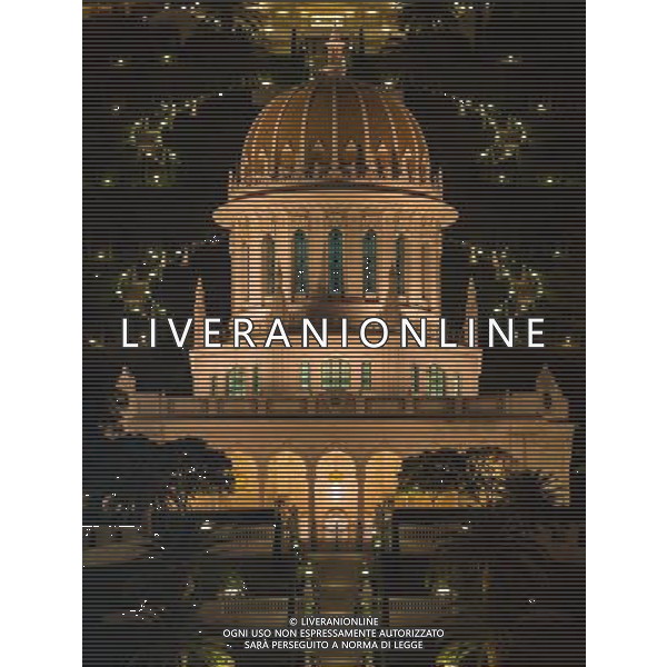 (131207) -- HAIFA (ISRAEL), Dec. 7, 2013 () -- Photo taken on Dec. 4, 2013, shows the night scene of terraces of the Shrine of the Bab in Haifa, Israel. The Baha\'i Holy Places in Haifa and Western Galilee in Israel was inscribed on the UNESCO World Heritage List in 2008 for their profound spiritual meaning and the testimony they bear to the strong tradition of pilgrimage in the Baha\'i faith. The property includes the two most holy places in the Baha\'i religion associated with the founders, the Shrine of Baha\'u\'llah in Acre and the Shrine of the Bab in Haifa, together with their surrounding gardens, associated buildings and monuments. These two shrines are part of a larger complex of buildings, monuments and sites at seven distinct locations in Haifa and Western Galilee that are visited as part of the Baha\'i pilgrimage. (/Li Rui) AG ALDO LIVERANI SAS ONLY ITALY