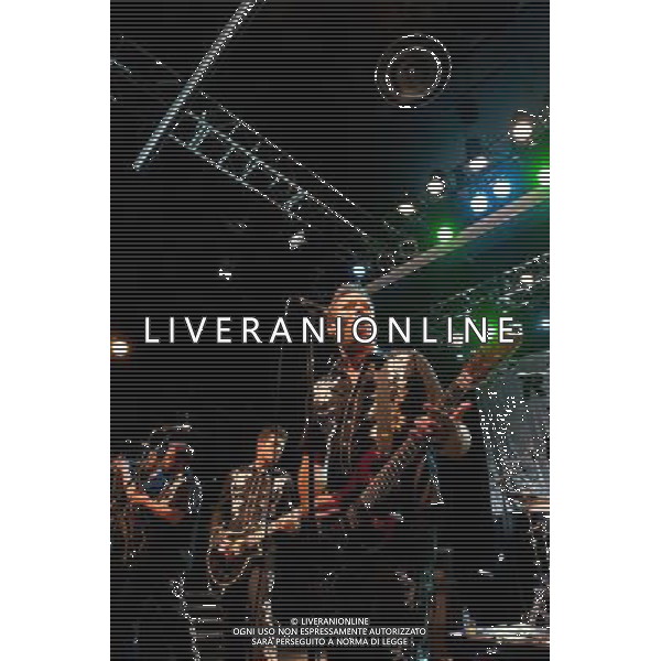 Rocket From The Crypt perform live at Koko, Camden, on Friday 6 December 2013. Picture shows Speedo (real name John Reis), Apollo 9 (real name Paul O\'Beirne), JC 2000 (real name Jason Crane) and ND (real name Andy Stamets). AG ALDO LIVERANI SAS ONLY ITALY