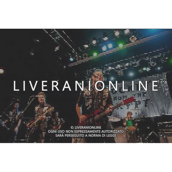 Rocket From The Crypt perform live at Koko, Camden, on Friday 6 December 2013. Picture shows Speedo (real name John Reis), Apollo 9 (real name Paul O\'Beirne), JC 2000 (real name Jason Crane), ND (real name Andy Stamets) and Ruby Mars (real name Mario Rubalcaba). AG ALDO LIVERANI SAS ONLY ITALY