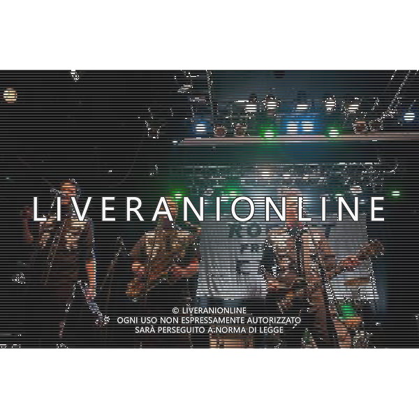 Rocket From The Crypt perform live at Koko, Camden, on Friday 6 December 2013. Picture shows Apollo 9 (real name Paul O\'Beirne), JC 2000 (real name Jason Crane) and ND (real name Andy Stamets). AG ALDO LIVERANI SAS ONLY ITALY