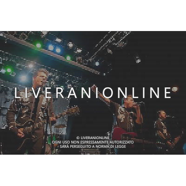 Rocket From The Crypt perform live at Koko, Camden, on Friday 6 December 2013. Picture shows Speedo (real name John Reis), ND (real name Andy Stamets) and Petey X ( real name Pete Reichert) . AG ALDO LIVERANI SAS ONLY ITALY