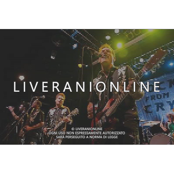 Rocket From The Crypt perform live at Koko, Camden, on Friday 6 December 2013. Picture shows Speedo (real name John Reis), Apollo 9 (real name Paul O\'Beirne), JC 2000 (real name Jason Crane) and ND (real name Andy Stamets). AG ALDO LIVERANI SAS ONLY ITALY