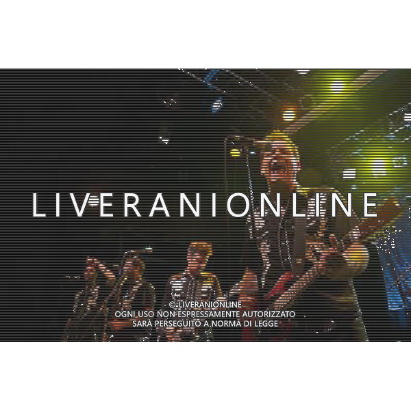 Rocket From The Crypt perform live at Koko, Camden, on Friday 6 December 2013. Picture shows Speedo (real name John Reis), Apollo 9 (real name Paul O\'Beirne), JC 2000 (real name Jason Crane) and ND (real name Andy Stamets). AG ALDO LIVERANI SAS ONLY ITALY