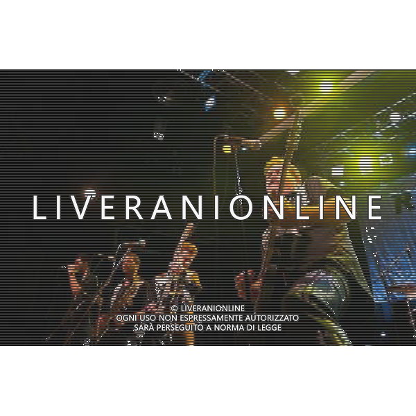 Rocket From The Crypt perform live at Koko, Camden, on Friday 6 December 2013. Picture shows Speedo (real name John Reis), Apollo 9 (real name Paul O\'Beirne), JC 2000 (real name Jason Crane) and ND (real name Andy Stamets). AG ALDO LIVERANI SAS ONLY ITALY