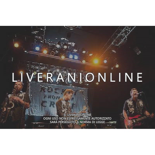 Rocket From The Crypt perform live at Koko, Camden, on Friday 6 December 2013. Picture shows Speedo (real name John Reis), Apollo 9 (real name Paul O\'Beirne) and ND (real name Andy Stamets). AG ALDO LIVERANI SAS ONLY ITALY