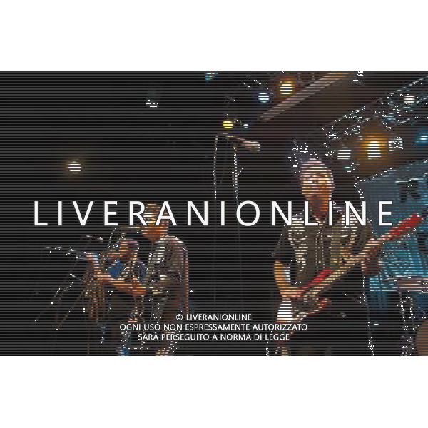 Rocket From The Crypt perform live at Koko, Camden, on Friday 6 December 2013. Picture shows Speedo (real name John Reis), Apollo 9 (real name Paul O\'Beirne), JC 2000 (real name Jason Crane) and ND (real name Andy Stamets). AG ALDO LIVERANI SAS ONLY ITALY