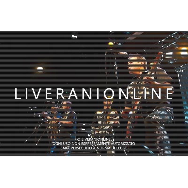 Rocket From The Crypt perform live at Koko, Camden, on Friday 6 December 2013. Picture shows Speedo (real name John Reis), Apollo 9 (real name Paul O\'Beirne), JC 2000 (real name Jason Crane) and ND (real name Andy Stamets). AG ALDO LIVERANI SAS ONLY ITALY