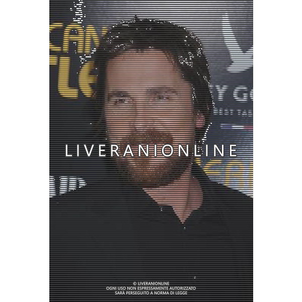 Christian Bale arrives at the World Premiere of \'American Hustle\' on December 8, 2013 at The Ziegfeld Theatre in New York City. AG ALDO LIVERANI SAS ONLY ITALY