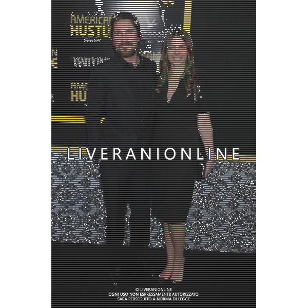 Christian Bale and wife arrive at the World Premiere of \'American Hustle\' on December 8, 2013 at The Ziegfeld Theatre in New York City. AG ALDO LIVERANI SAS ONLY ITALY