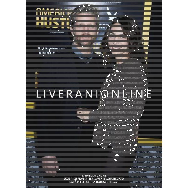 Paul Sparks and Annie Parisse arrives at the World Premiere of \'American Hustle\' on December 8, 2013 at The Ziegfeld Theatre in New York City. AG ALDO LIVERANI SAS ONLY ITALY