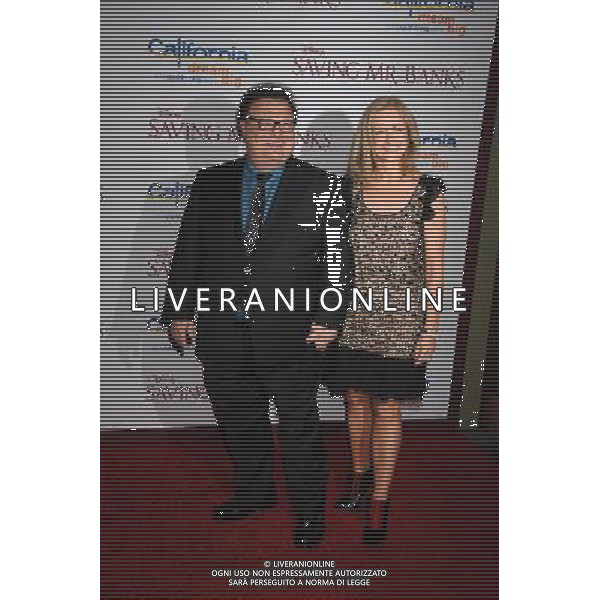 Actor Wayne Knight (L) and Clare De Chenu arrive at the \'Saving Mr. Banks\' - Los Angeles Premiere at Walt Disney Studios on December 9, 2013 in Burbank, California. ©PHOTOSHOT/AGENZIA ALDO LIVERANI SAS - ITALY ONLY - EDITORIAL USE ONLY