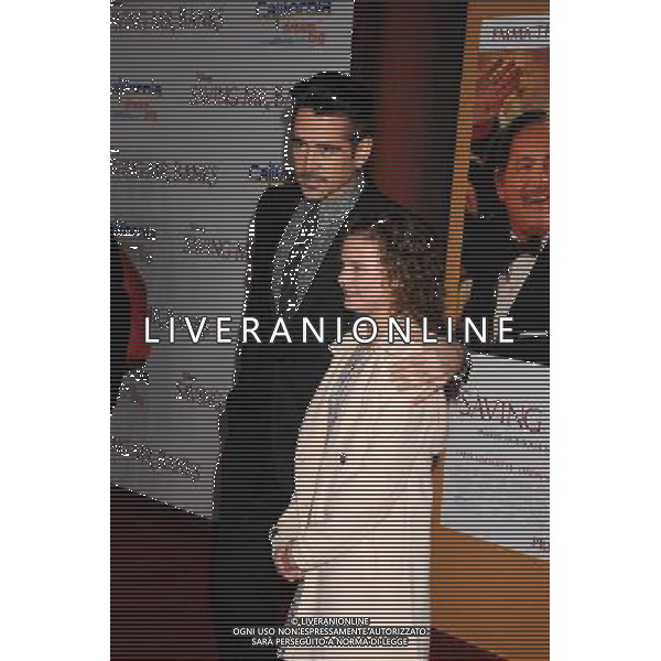 Actor Colin Farrell (L) and actress Annie Rose Buckley arrive at the \'Saving Mr. Banks\' - Los Angeles Premiere at Walt Disney Studios on December 9, 2013 in Burbank, California. ©PHOTOSHOT/AGENZIA ALDO LIVERANI SAS - ITALY ONLY - EDITORIAL USE ONLY