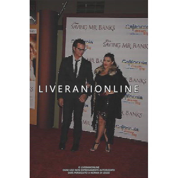 Actor Lorenzo Lamas (L) and Shawna Craig arrive at the \'Saving Mr. Banks\' - Los Angeles Premiere at Walt Disney Studios on December 9, 2013 in Burbank, California. ©PHOTOSHOT/AGENZIA ALDO LIVERANI SAS - ITALY ONLY - EDITORIAL USE ONLY