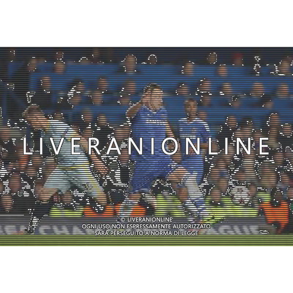 Chelsea\'s John Terry beats Steaua Bucuresti\'s Pantelis Kapetanos Photo by Kieran Galvin/CameraSport Football - UEFA Champions League Group E - Chelsea v FC Steaua Bucuresti - Wednesday 11th December 2013 - Stamford Bridge - London © CameraSport - 43 Linden Ave. Countesthorpe. Leicester. England. LE8 5PG - Tel: +44 (0) 116 277 4147 - admin@camerasport.com - www.camerasport.com AG ALDO LIVERANI SAS ONLY ITALY