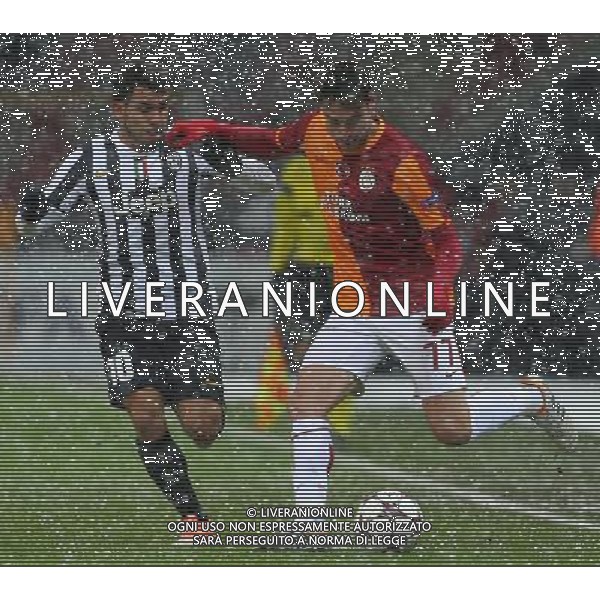 Bildnummer: 15243707 Datum: 10.12.2013 Copyright: imago/Seskim Photo UEFA Champions League group B match between Galatasaray Istanbul and Juventus at Turk Telekom Arena Stadium on December 10, 2013 in Istanbul, Turkey. Pictured: Carlos Tevez of Juventus and Albert Riera of Galatasaray. PUBLICATIONxNOTxINxTUR ; Fussball CHampions League 2014 Turin xas x0x 2013 quadrat premiumd AG ALDO LIVERANI SAS ONLY ITALY