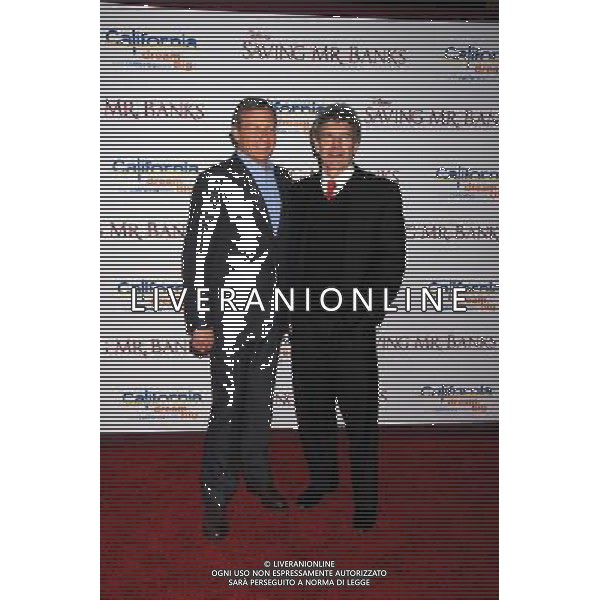 Chairman and CEO, The Walt Disney Company Bob Iger; (L) and Chairman of the Walt Disney Studios Alan Horn arrive at the \'Saving Mr. Banks\' - Los Angeles Premiere at Walt Disney Studios on December 9, 2013 in Burbank, California. AG ALDO LIVERANI SAS ONLY ITALY