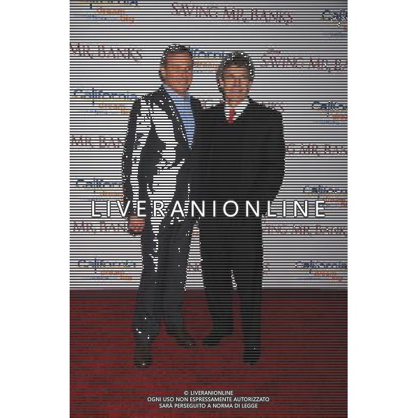 Chairman and CEO, The Walt Disney Company Bob Iger; (L) and Chairman of the Walt Disney Studios Alan Horn arrive at the \'Saving Mr. Banks\' - Los Angeles Premiere at Walt Disney Studios on December 9, 2013 in Burbank, California. AG ALDO LIVERANI SAS ONLY ITALY