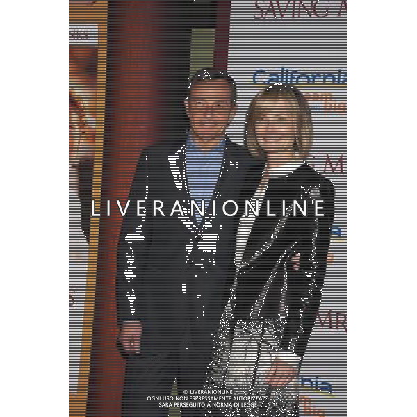 Chairman and CEO, The Walt Disney Company Bob Iger (L) and wife Willow Bay arrive at the \'Saving Mr. Banks\' - Los Angeles Premiere at Walt Disney Studios on December 9, 2013 in Burbank, California. AG ALDO LIVERANI SAS ONLY ITALY