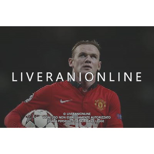(131211) -- MANCHESTER, Dec. 11, 2013 () -- Wayne Rooney of Manchester United looks on during the UEFA Champions League Group A match between Manchester United and Shakhtar Donetsk at Old Trafford Stadium in Manchester, Britain on Dec. 10, 2013. Manchester United won 1-0. (/Wang Lili) AG ALDO LIVERANI SAS ONLY ITALY