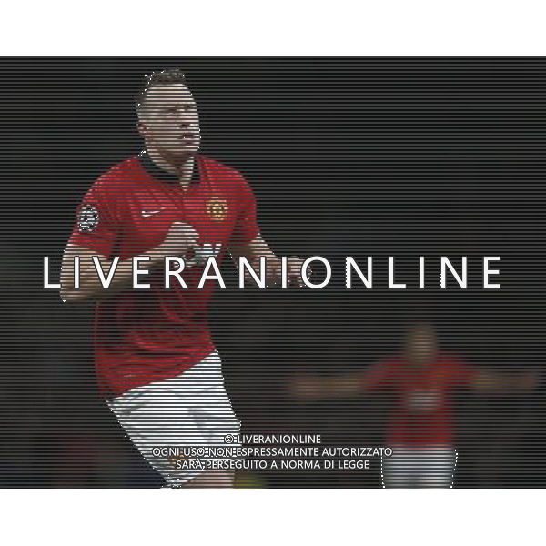 (131211) -- MANCHESTER, Dec. 11, 2013 () -- Phil Jones of Manchester United celebrates scoring during the UEFA Champions League Group A match between Manchester United and Shakhtar Donetsk at Old Trafford Stadium in Manchester, Britain on Dec. 10, 2013. Manchester United won 1-0. (/Wang Lili) AG ALDO LIVERANI SAS ONLY ITALY