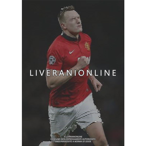 (131211) -- MANCHESTER, Dec. 11, 2013 () -- Phil Jones of Manchester United celebrates scoring during the UEFA Champions League Group A match between Manchester United and Shakhtar Donetsk at Old Trafford Stadium in Manchester, Britain on Dec. 10, 2013. Manchester United won 1-0. (/Wang Lili) AG ALDO LIVERANI SAS ONLY ITALY