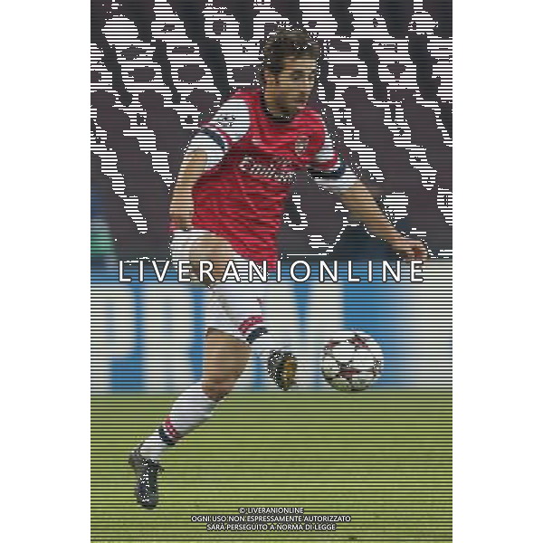 ARSENAL FOOTBALL CLUB NELLA FOTO: MATHIEU FLAMINI FOTO MOSCA- AG.LIVERANI NAPOLI ARSENAL CHAMPIONS LEAGUE 11-12-2012 AG ALDO LIVERANI SAS