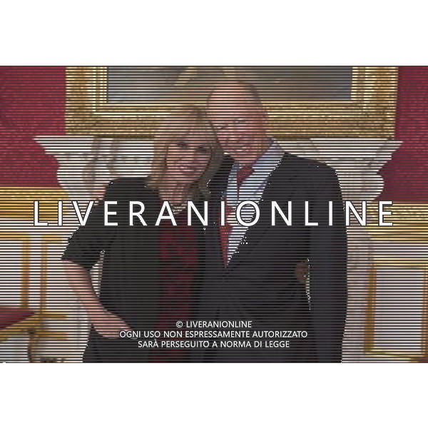 Joanna Lumley with Lord Jacob Rothschild one of the 2013 recipients of the The Prince of Wales Medal for Philanthropy pose for the camera following the award ceremony in St James\'s Palace in London, Wednesday, Dec. 11, 2013. (AP Photo/Alastair Grant ,Pool) ©photoshot/AGENZIA ALDO LIVERANI SAS - ITALY ONLY - REALI INGLESI: Il principe Carlo alla cerimonia di consegna delle Medaglie per la Filantropia per il 2013 a St James Place di Londra, 11 Dicembre 2013.
