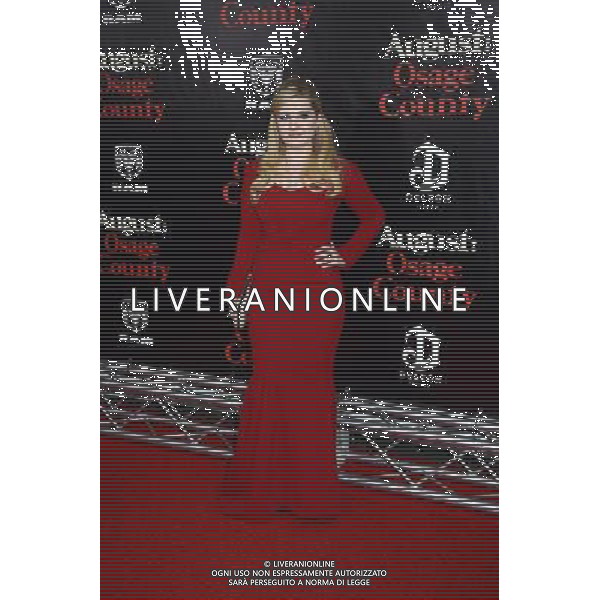 Abigail Breslin in red Zac Posen dress attends the New York Premiere of \'August: Osage County\' on December 12, 2013 at the Ziegfeld Theatre in New York City. AG ALDO LIVERANI SAS ONLY ITALY