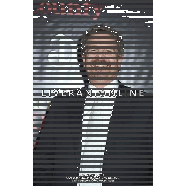 director John Wells attends the New York Premiere of \'August: Osage County\' on December 12, 2013 at the Ziegfeld Theatre in New York City. AG ALDO LIVERANI SAS ONLY ITALY