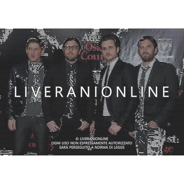 Matthew Followill, Nathan Followill, Jared Followill and Caleb Followill of Kings of Leon attend the \'August: Osage County\' premiere at Ziegfeld Theater on December 12, 2013 in New York City AG ALDO LIVERANI SAS ONLY ITALY
