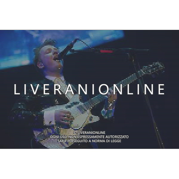 Alex Trimble of Northern Irish Indie rock band Two Door Cinema Club performs at their biggest show in London to date at The O2 Arena, London, England, UK on Friday 13th December. The band consists of Alex Trimble (lead vocals/guitar), Kevin Baird (bass) and Sam Halliday (lead guitar). ©PHOTOHSOT/AGENZIA ALDO LIVERANI SAS - ITALY ONLY - EDITORIAL USE ONLY