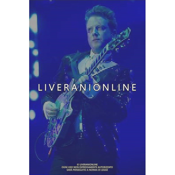 Alex Trimble of Northern Irish Indie rock band Two Door Cinema Club performs at their biggest show in London to date at The O2 Arena, London, England, UK on Friday 13th December. The band consists of Alex Trimble (lead vocals/guitar), Kevin Baird (bass) and Sam Halliday (lead guitar). ©PHOTOHSOT/AGENZIA ALDO LIVERANI SAS - ITALY ONLY - EDITORIAL USE ONLY