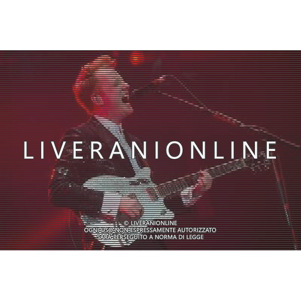 Alex Trimble of Northern Irish Indie rock band Two Door Cinema Club performs at their biggest show in London to date at The O2 Arena, London, England, UK on Friday 13th December. The band consists of Alex Trimble (lead vocals/guitar), Kevin Baird (bass) and Sam Halliday (lead guitar). ©PHOTOHSOT/AGENZIA ALDO LIVERANI SAS - ITALY ONLY - EDITORIAL USE ONLY